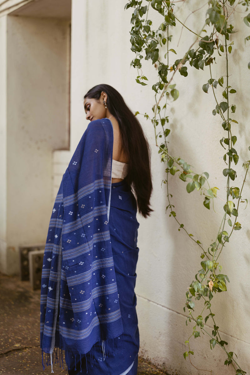 Arrangement of Jamdani Motifs on a pallu of a saree in natural indigo 