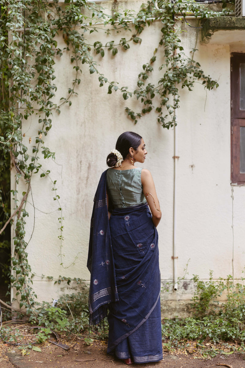 Women wearing indigo jamdani festive saree 