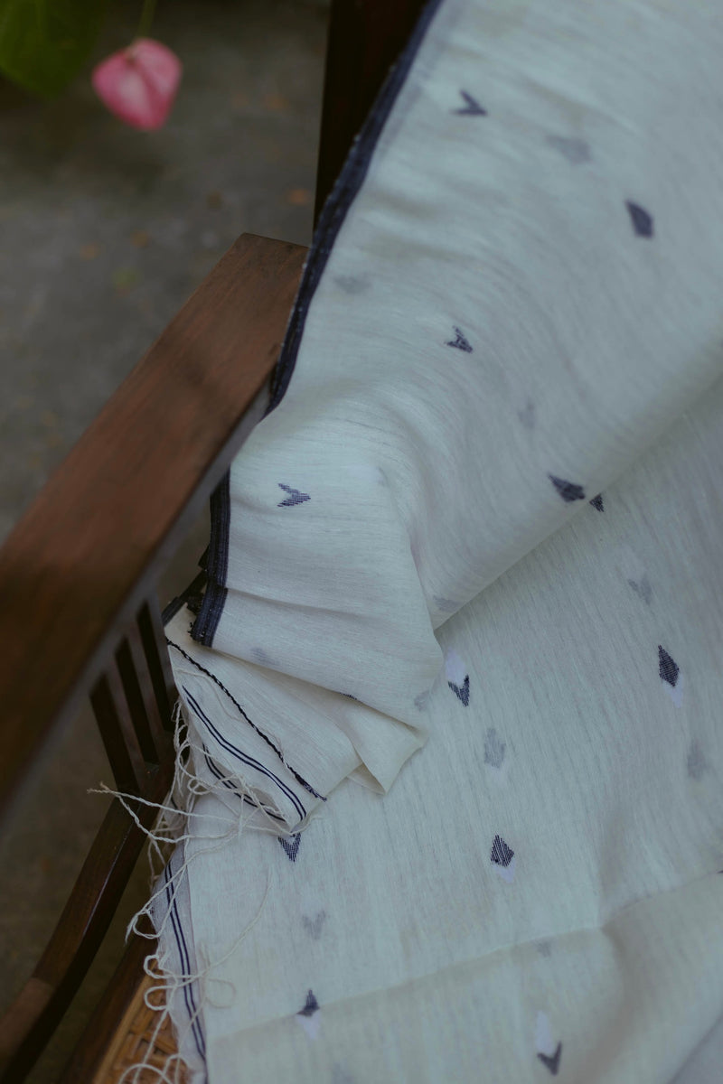 Artisan-crafted White and Indigo handloom linen saree with subtle Jamdani detailing