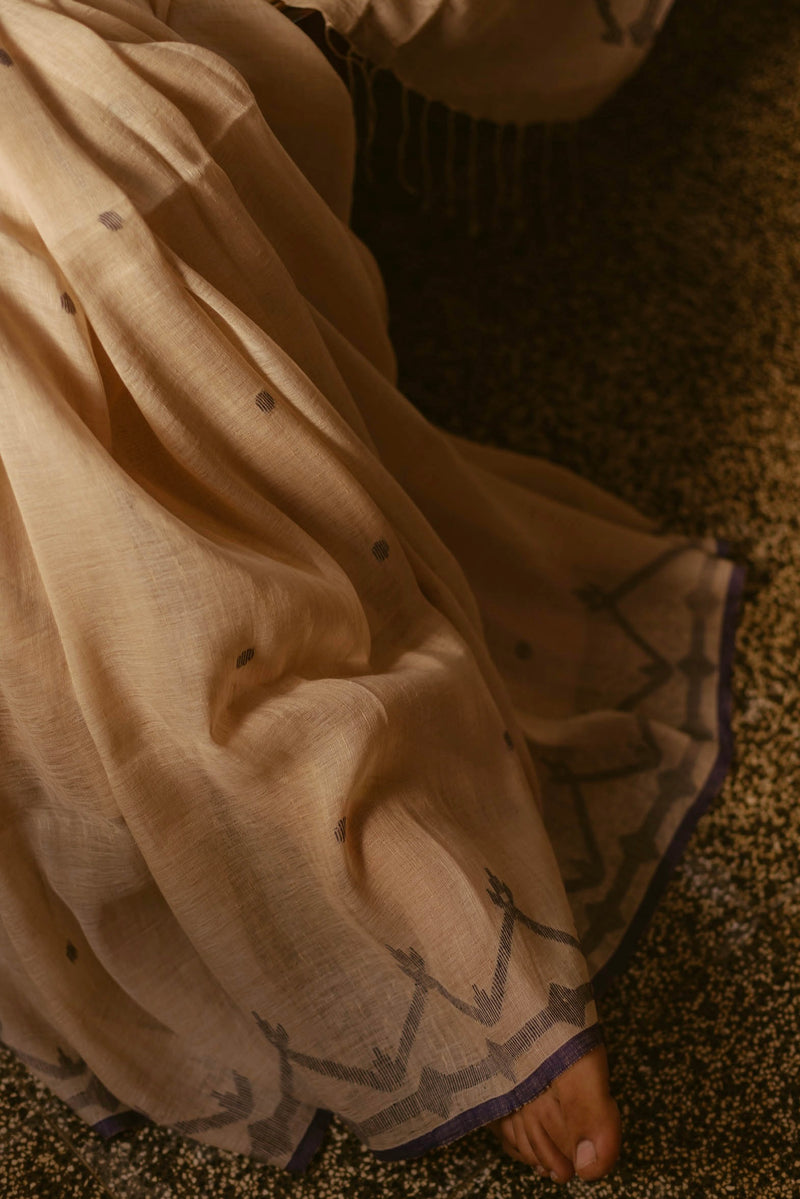 Artisan-crafted Beige & Indigo Linen Jamdani Saree perfect for festive wear.