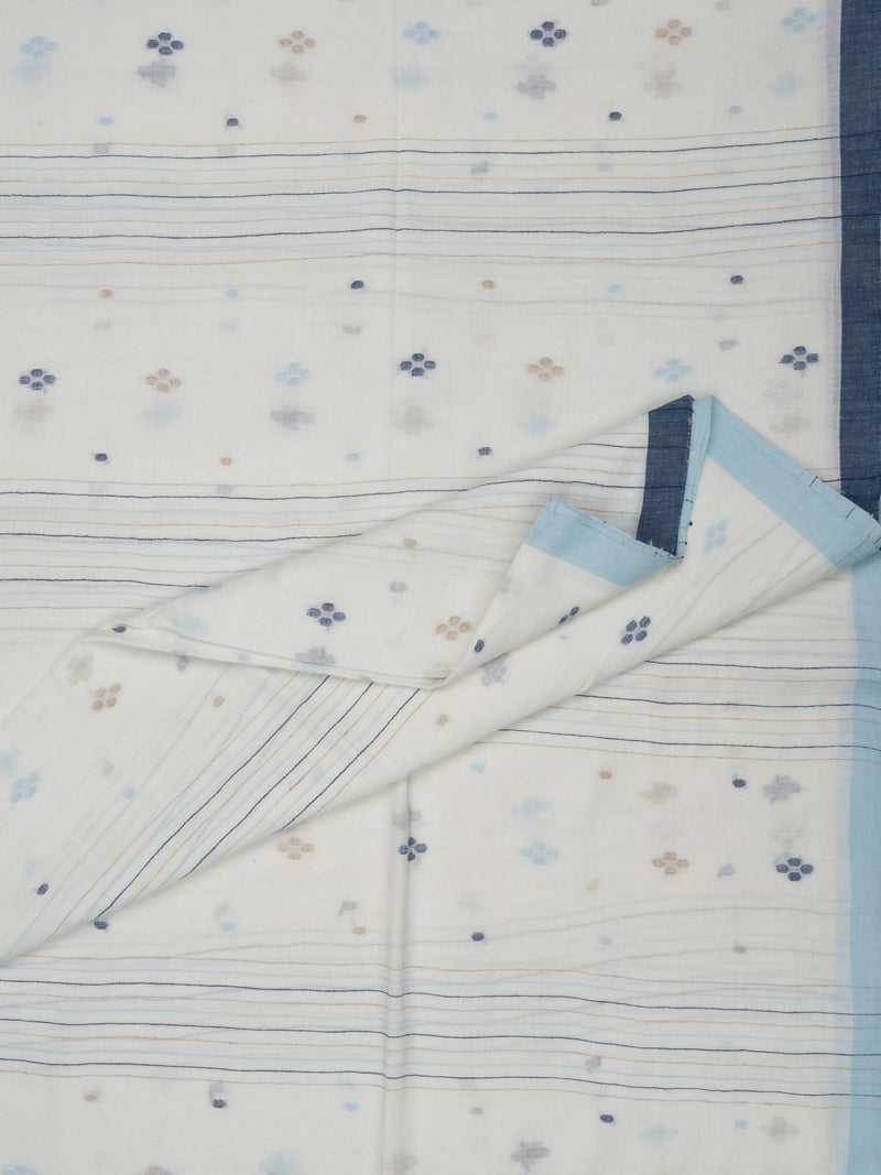 Close-up of the beige floral motifs woven into the white cotton saree from varsaaedit