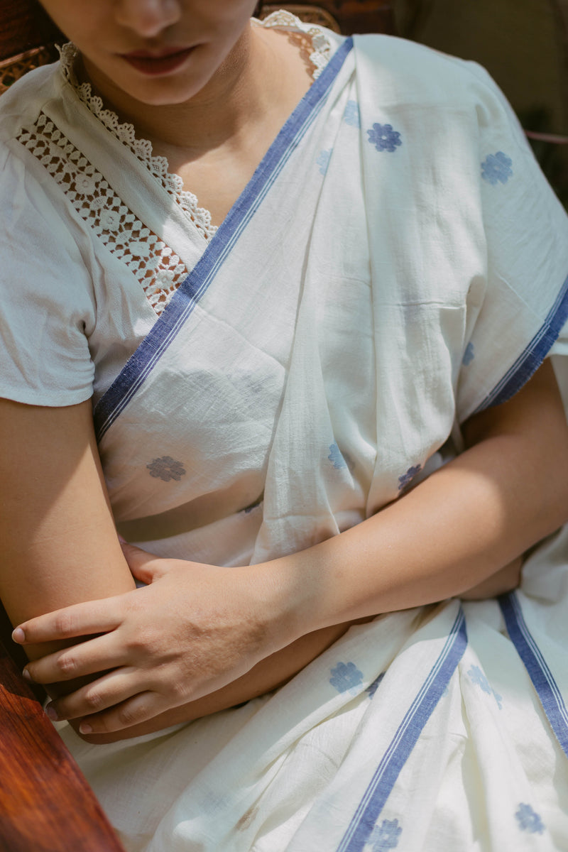 White cotton Jamdani Saree with Indigo woven designs and lace edging