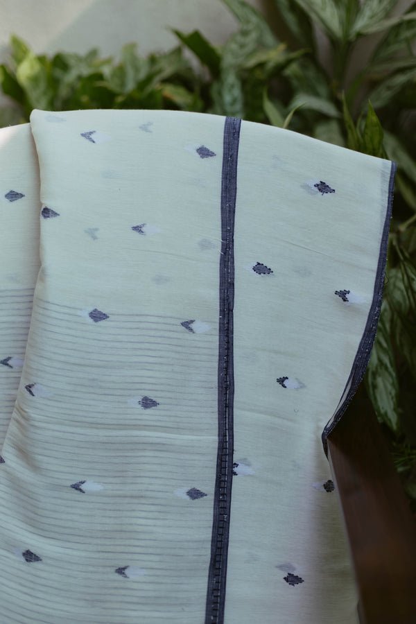 Elegant White & Indigo Jamdani saree in pure handwoven linen featuring minimalist geometric patterns.