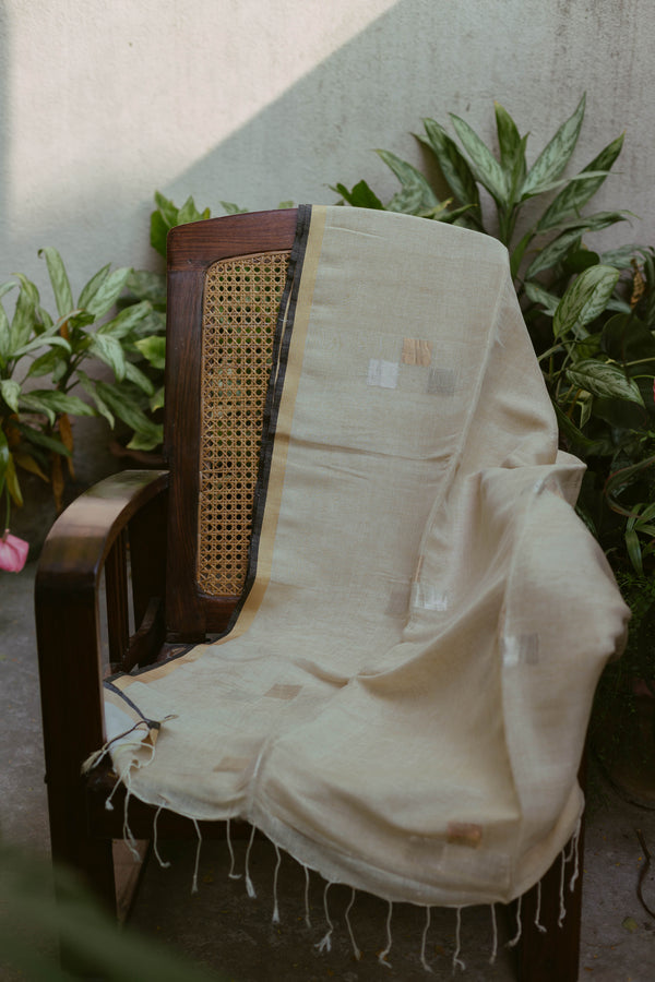 Elegant Ivory & Gold Handwoven Pure Linen Saree with black border, crafted for timeless sophistication and comfort