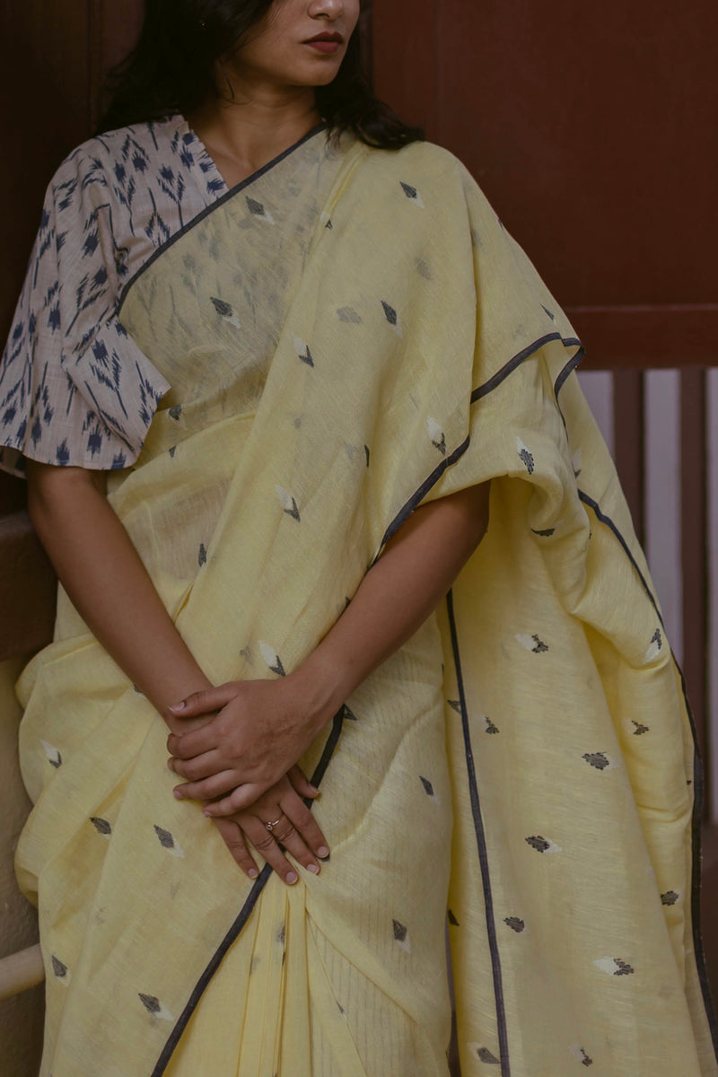 Traditional Linen Jamdani Saree in Lemon Yellow, styled for casual elegance