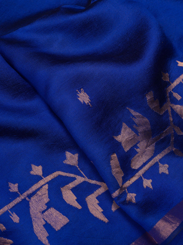 Royal indigo handwoven silk jamdani saree with floral vines border and antique zari selvedge.