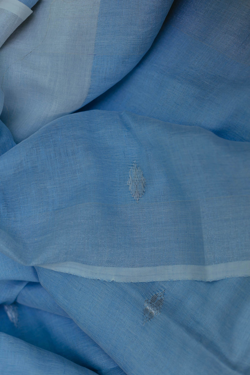 Traditional baby blue and silver linen Jamdani saree for festive and casual wear