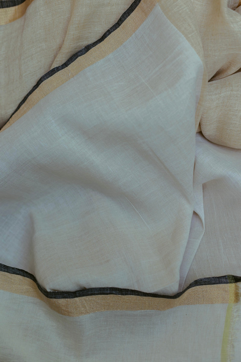 Artisan-made Ivory & Gold Handloom Pure Linen Saree, lightweight and breathable with a graceful drape.