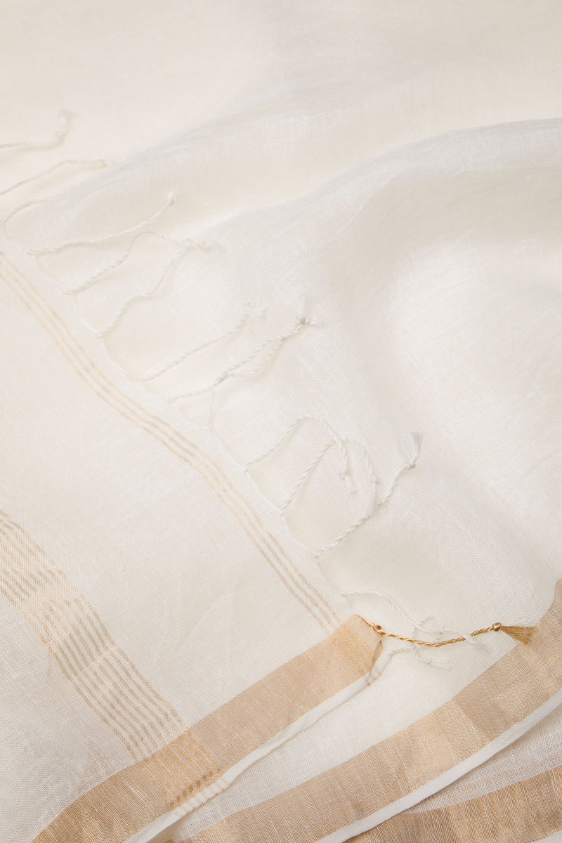 Luxury handwoven linen silk saree in off-white with gold zari craftsmanship
