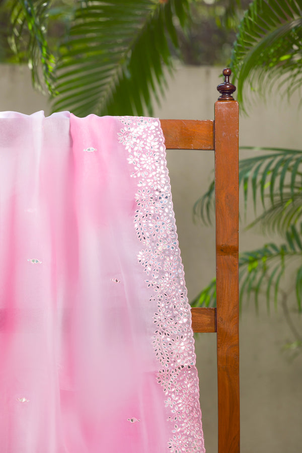 Blush pink organza saree with mirror work and scalloped floral cutwork border
