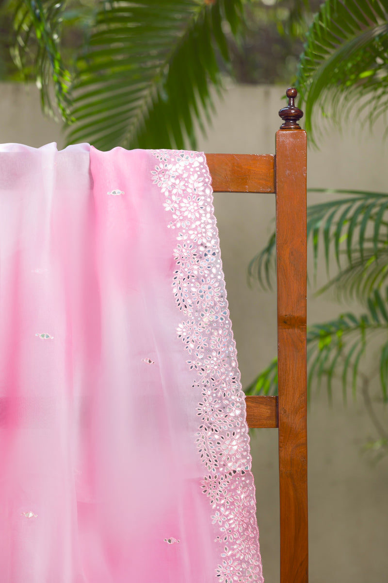 Blush pink organza saree with mirror work and scalloped floral cutwork border