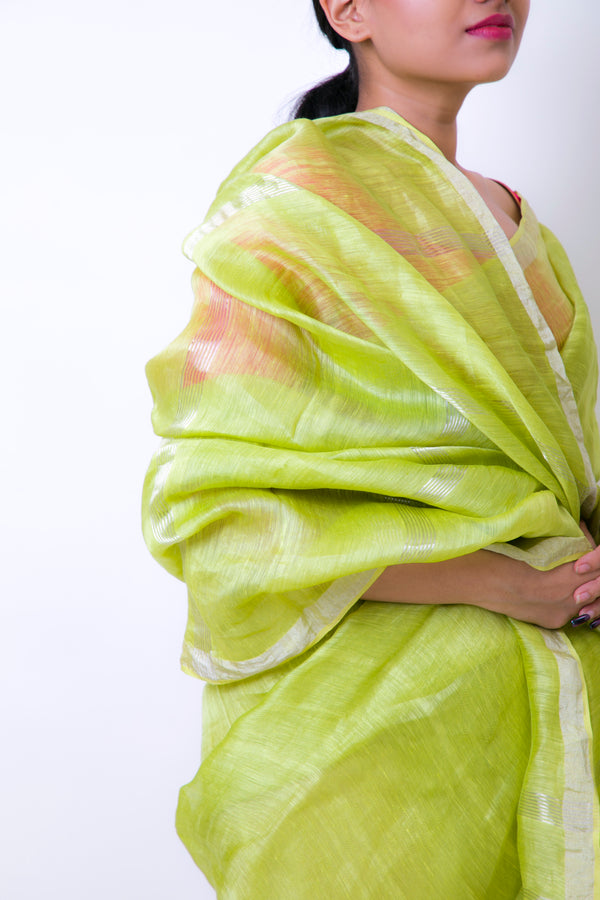 Close-up view of Gorgeous Green handwoven linen silk saree with detailed fabric texture