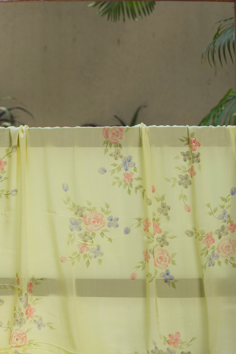 Designer silk organza saree in soft yellow with roses and floral detailing