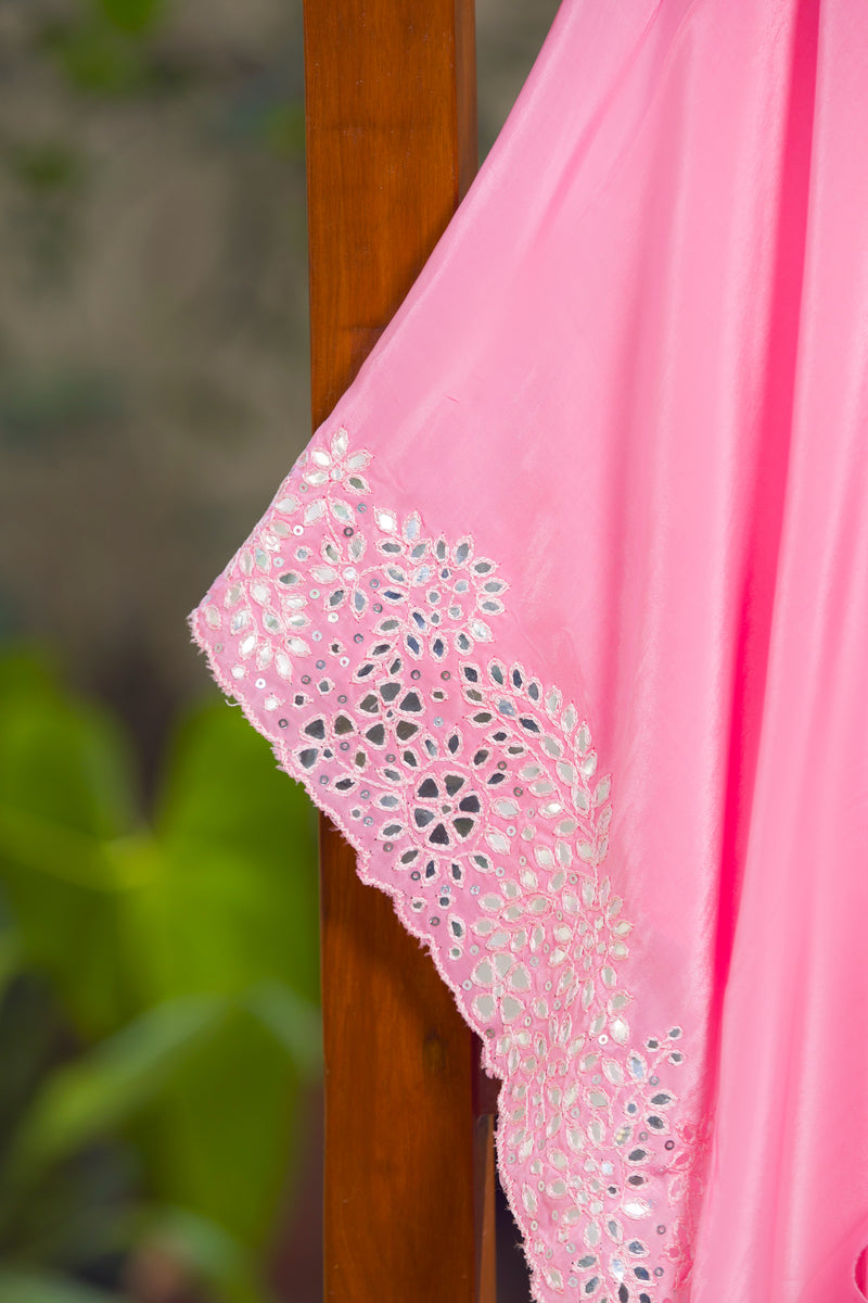 Elegant pink mirror-work organza saree with tiny buti motifs across the drape