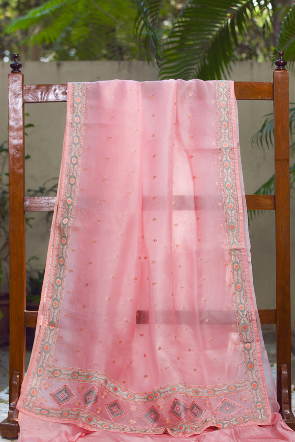 Elegant Pink Organza Saree with Floral Embroidery – Featuring delicate floral embroidery on a light pink silk organza saree