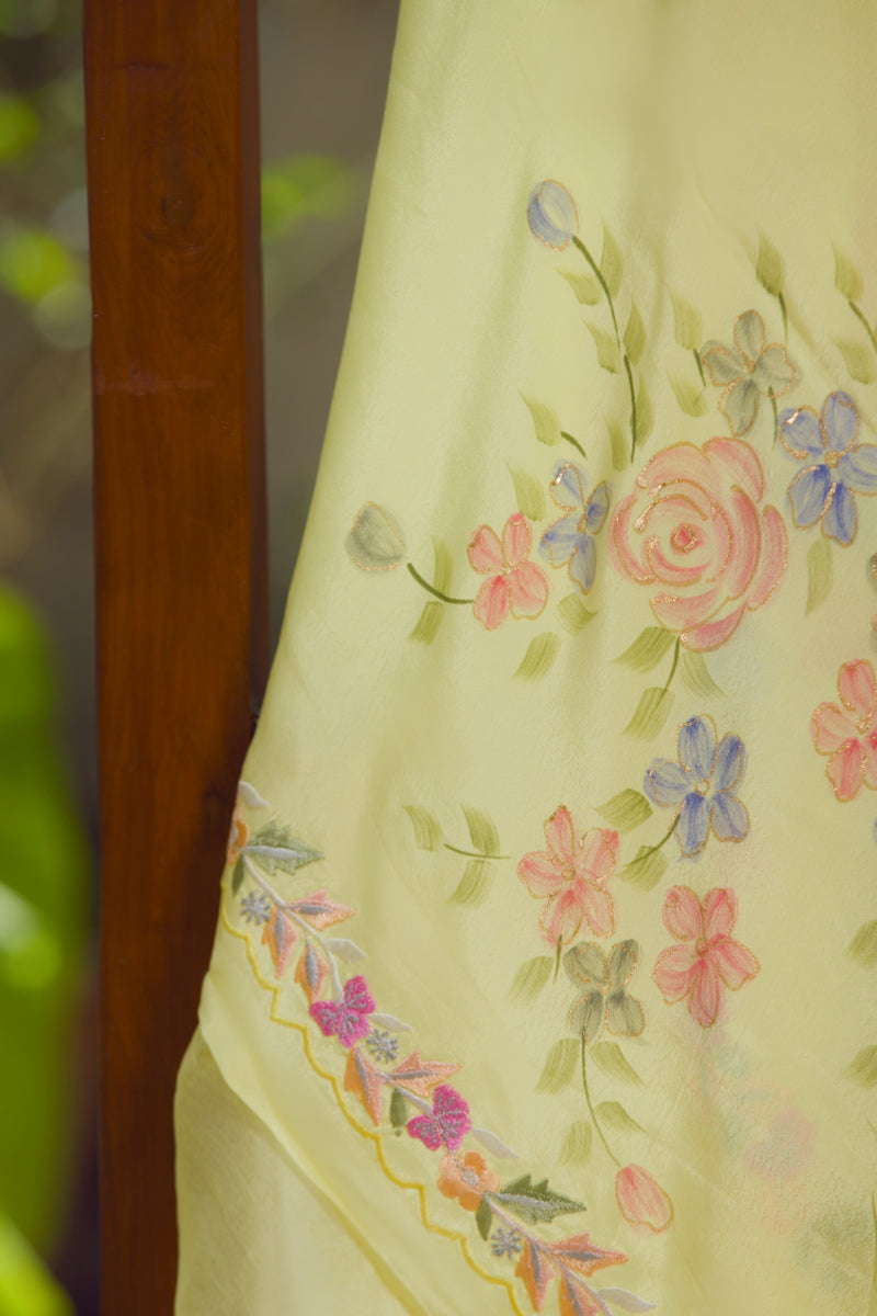 Floral organza silk saree with embroidered scalloped border for summer weddings
