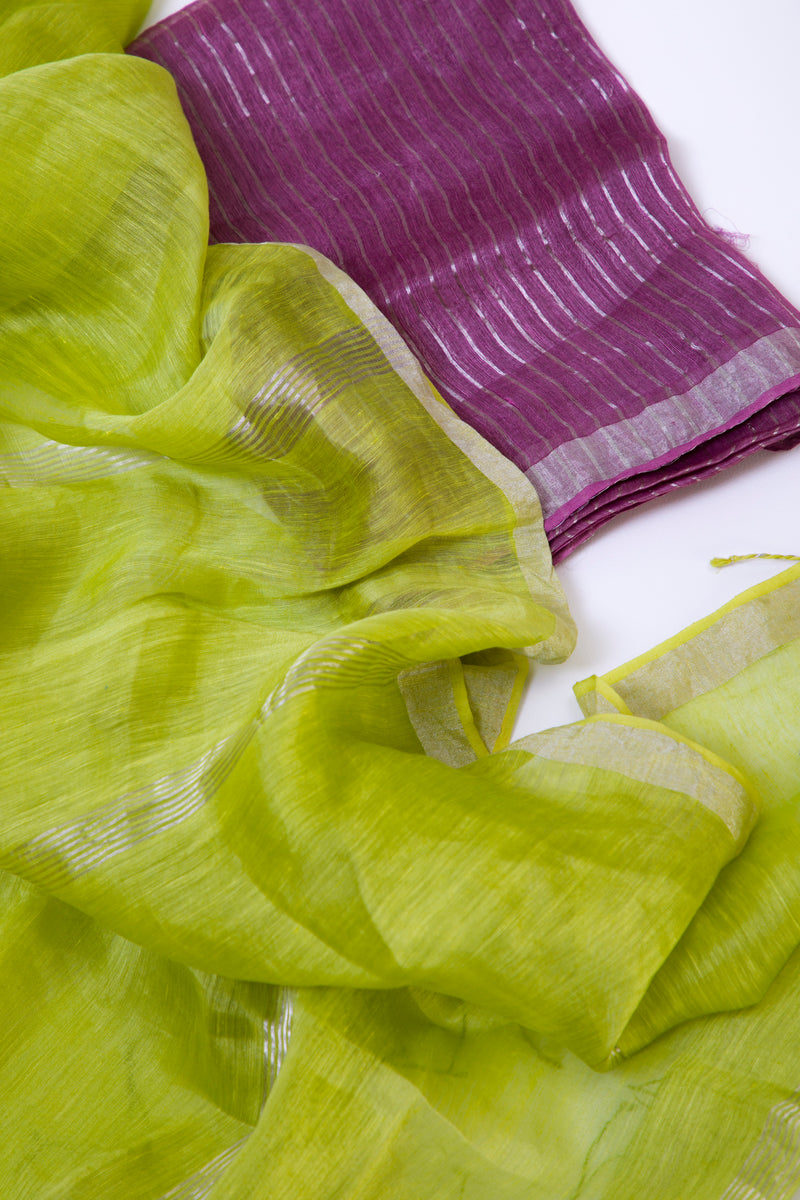 Full view of the Gorgeous Green handwoven linen silk saree styled with a pink blouse