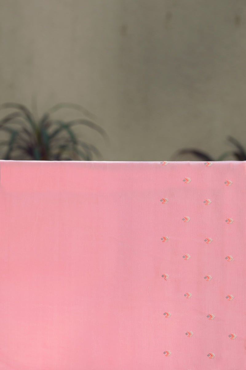Handcrafted Pink Silk Organza Saree with Floral and Geometric Embroidery – Detailed view of a handcrafted pink silk organza saree with a mix of floral and geometric embroidery.