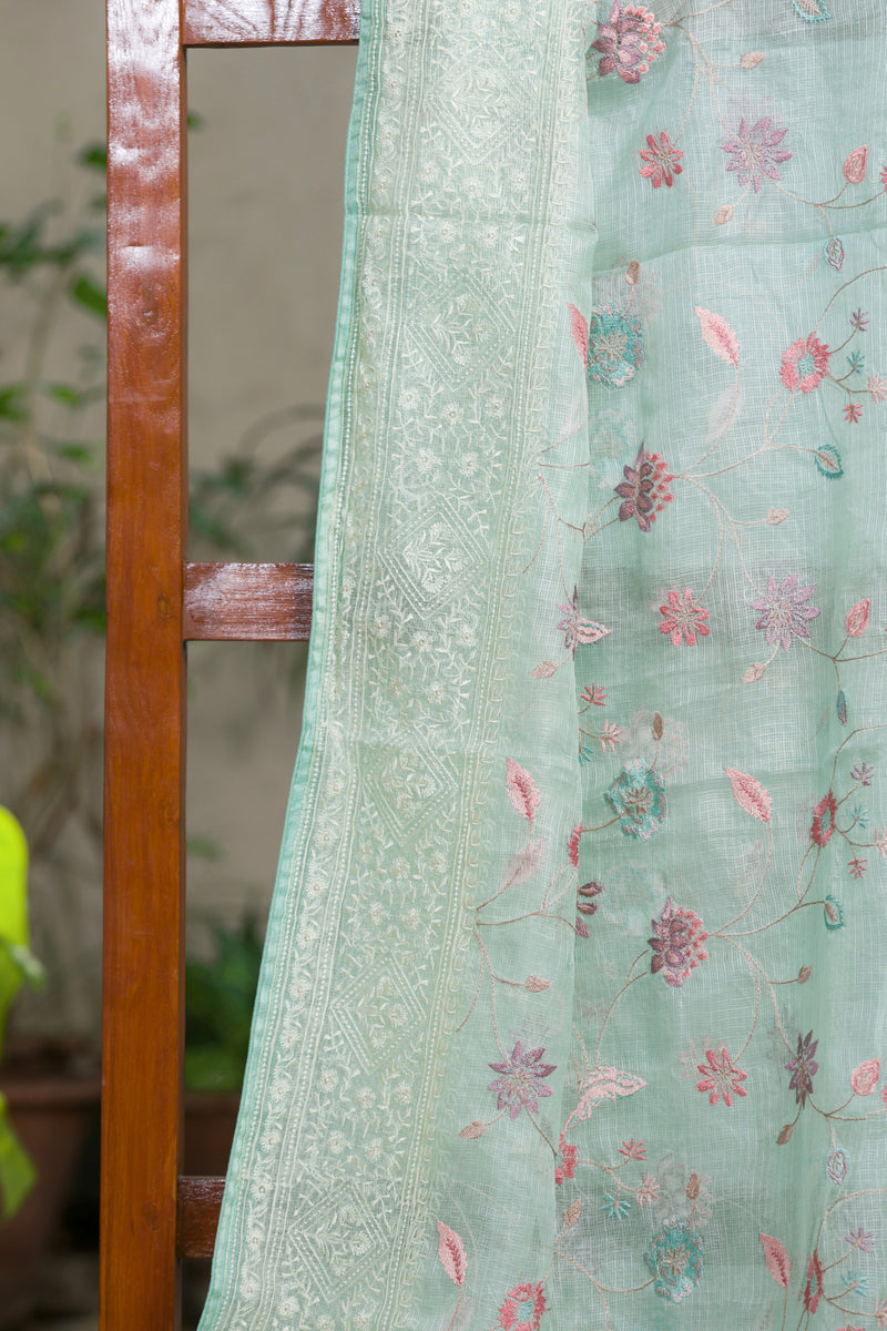 Soft Green Kota Silk Saree with Delicate Embroidered Flowers
