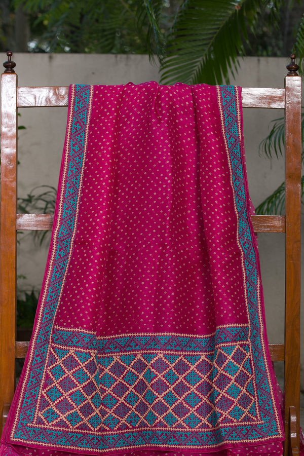 Traditional Kutch Embroidery Border on Pink Organza Saree for Special Occasions