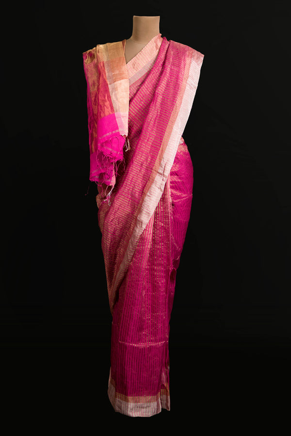 Vibrant Pink Saree with Soft Silk Texture and Shimmering Finish