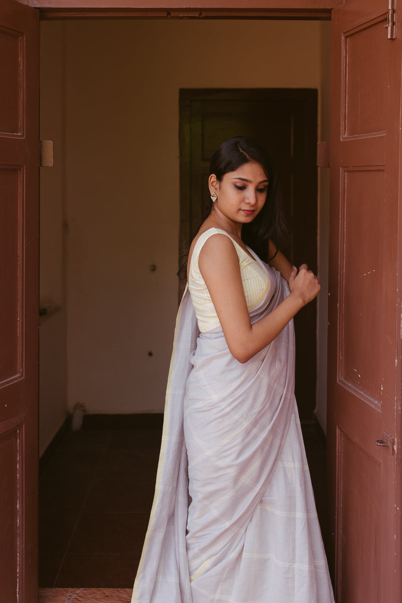 Yellow and white summer silk cotton saree for a fresh look